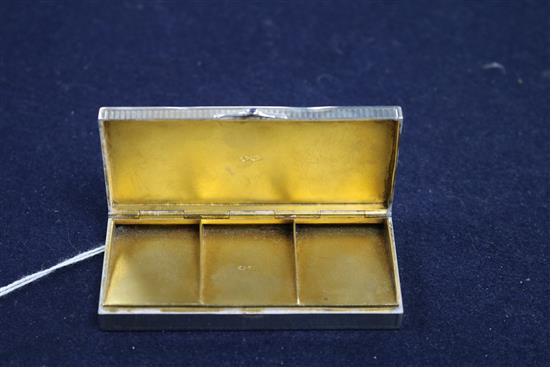 An Edwardian silver and enamel triple compartment stamp box, import marks for London, 1907, 8cm.